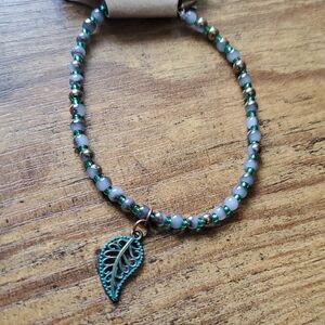 Chic Beaded Bracelet with Leaf Charm